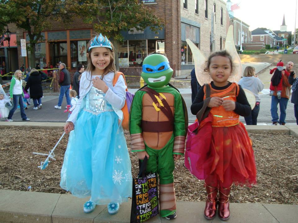 Kids dressed in costumes for West Bend Fall Fest